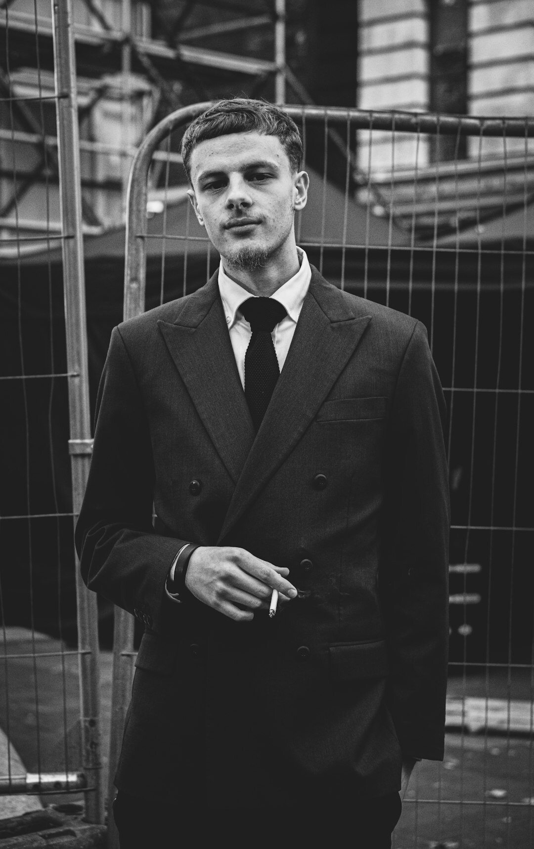 Studio portrait of an Argentine film actor in a tailored suit