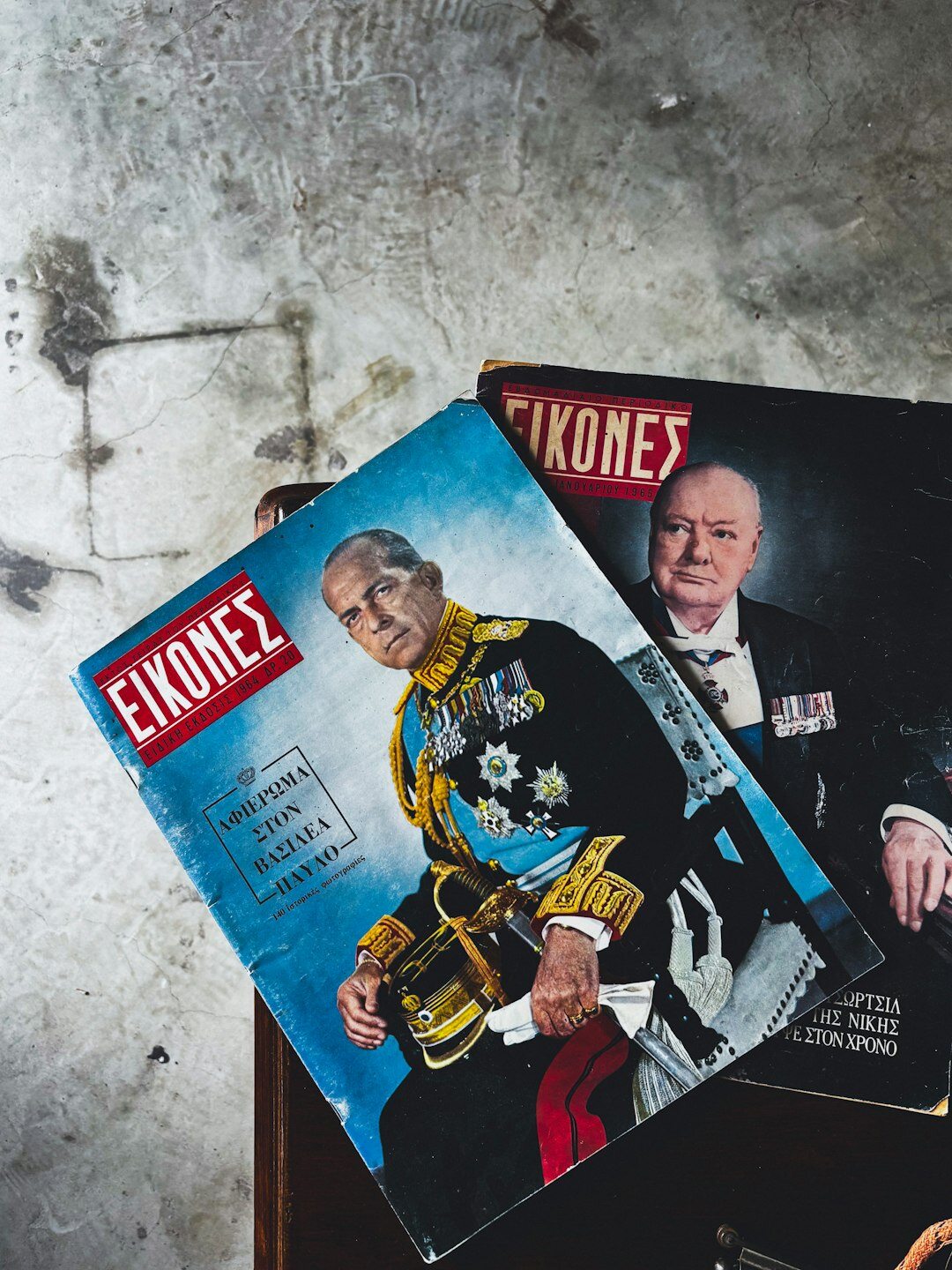Stack of vintage magazine covers and archival photographs